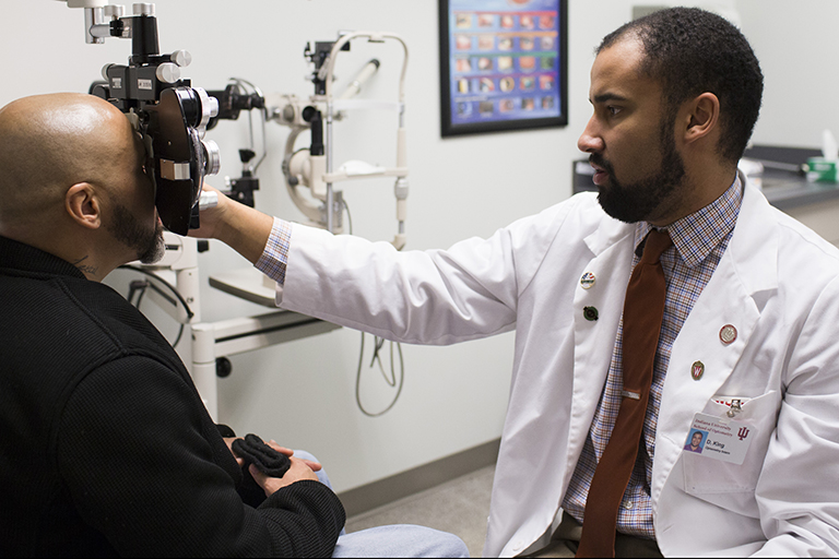 IU School of Optometry student seeing a patient